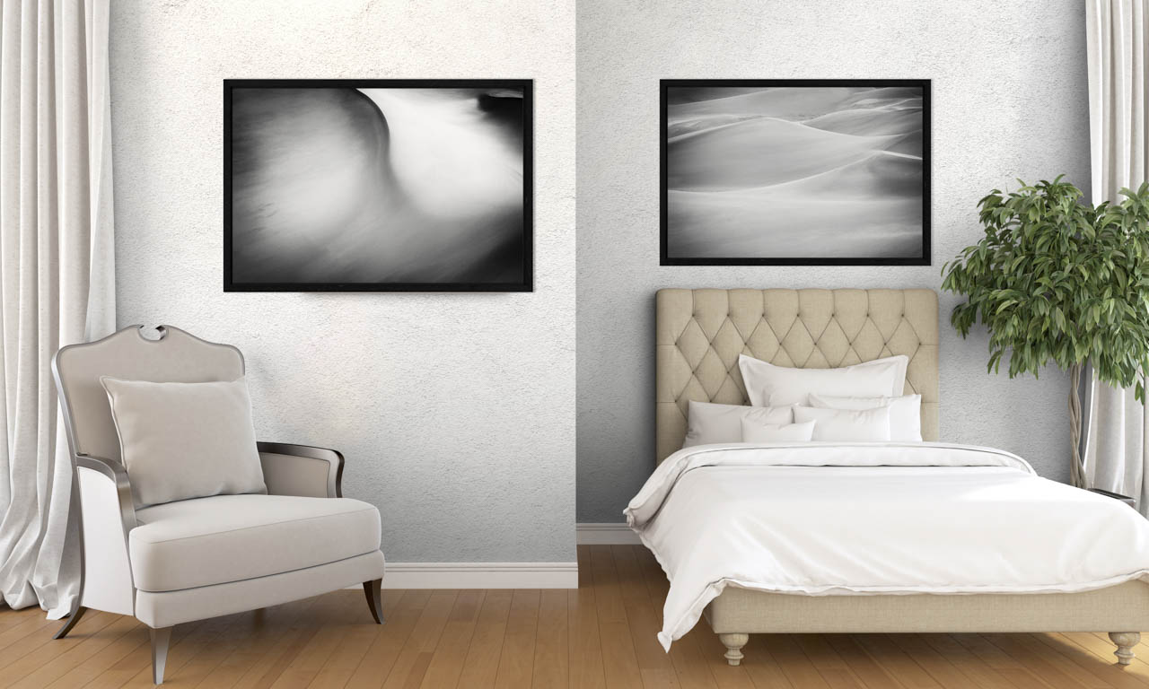 Two black and white fine art prints exposed in a bedroom.