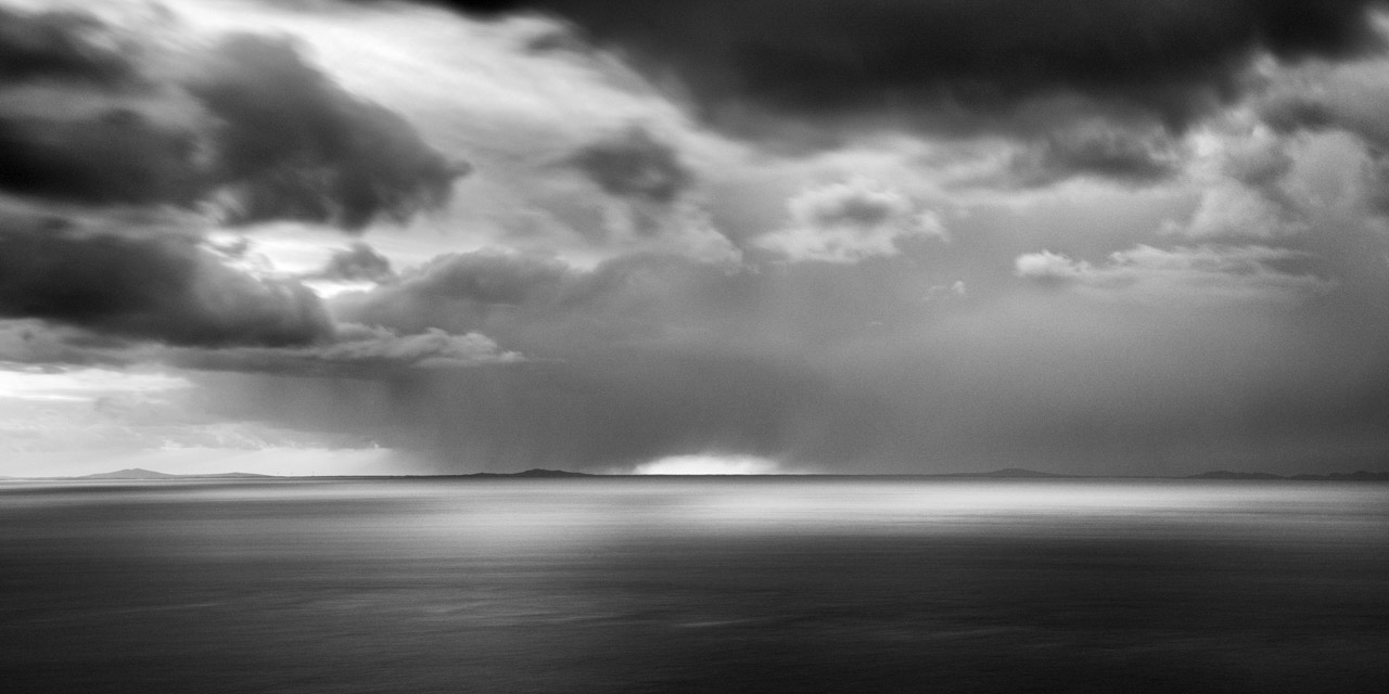 Seascape of Isle of Skye in Scotland in black and white.