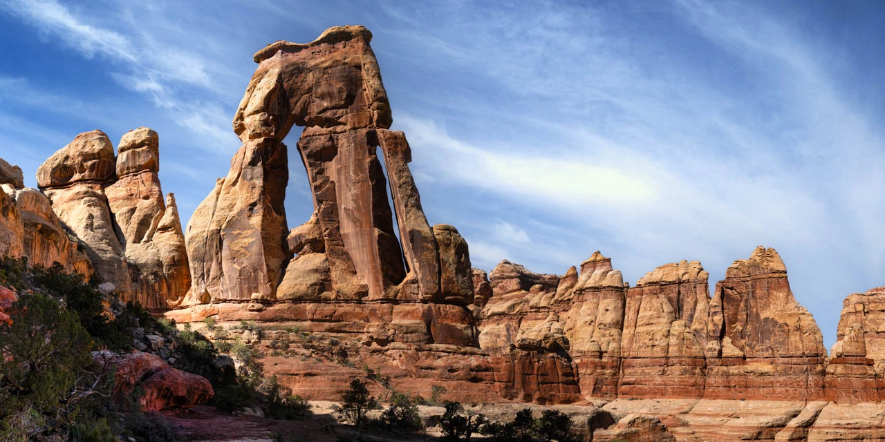 Landscape of a Druid Arch in Needles in Canyonlands National Park. Fine art Photograph in color by Amar Guillen, photographer artist.