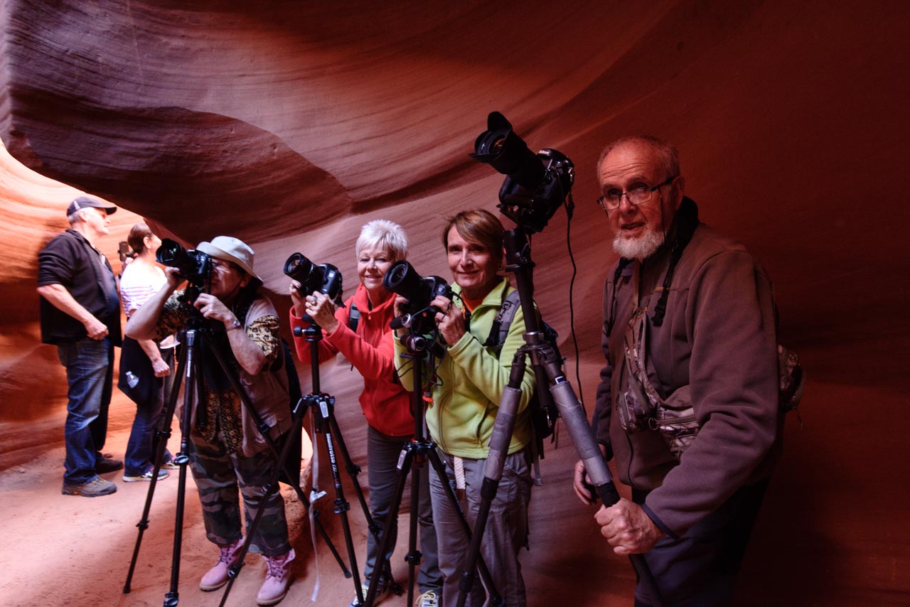 A group of landscape photographers in a slot of Antelop Canyon in Arizona, United States.