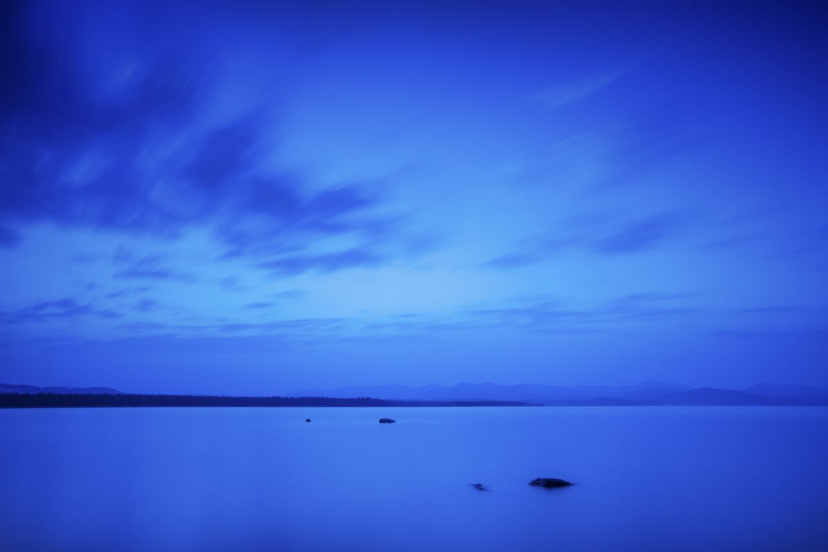 Blue hour at dawn on Yellowstone lake. Blue hour at dawn on Yellowstone lake.