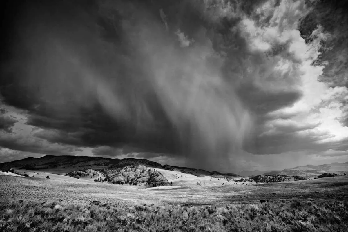 Photo in black and white of a storm over Yellowstone. Photo in black and white of a storm over Yellowstone.