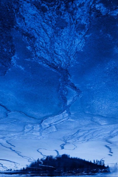 Reflection on water of a landscape of Yellowstone. Conceptual ph Reflection on water of a landscape of Yellowstone. Conceptual ph