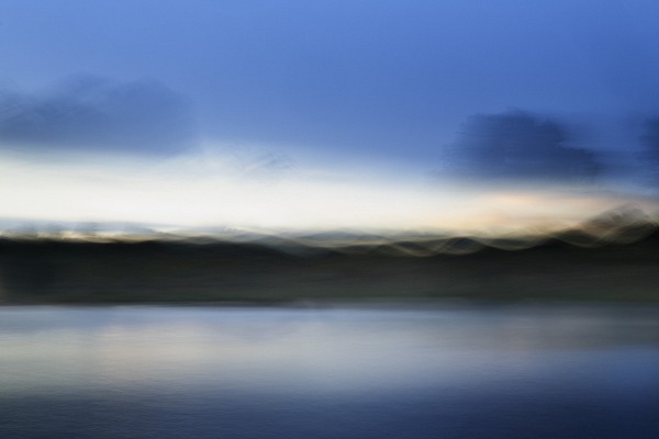 Landscape of a wetland photographed blurred. Fine art Photograph in color by Amar Guillen, photographer artist.