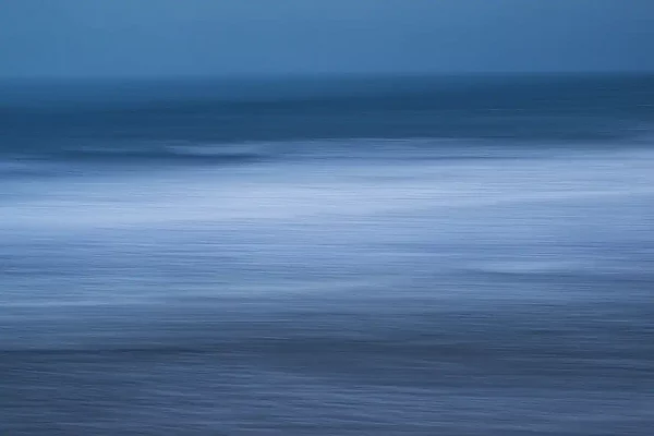 Atlantic ocean photographed in a blurry way with ICM technique from the coast of South Finistere. Fine art Photograph in black and white by Amar Guillen, photographer artist.