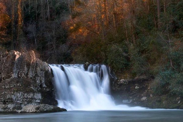 This photograph of a waterfall in the Smoky Mountains is constructed with different elements. It evokes the time passing.