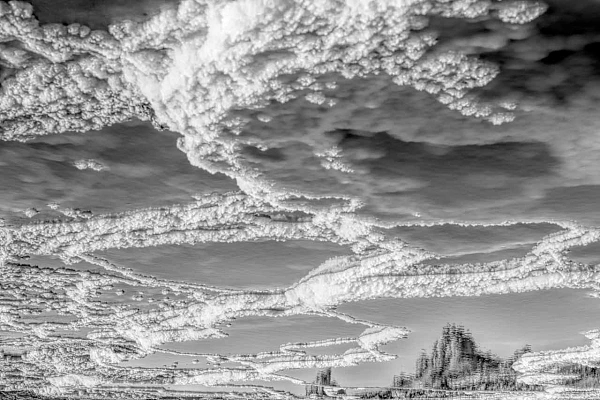 Black and white landscape of Dallol photographed with reflections. Black and white art photography by Amar Guillen, artist photographer.