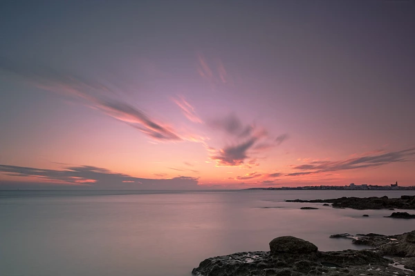 Sunset over Gironde Estuary in Charente-Maritime in France. Photograph by Amar Guillen, photographer artist.