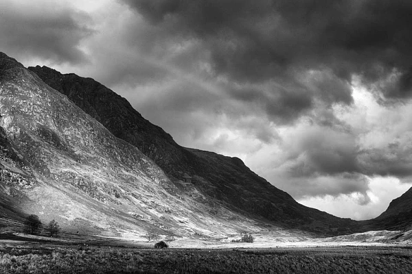 Landscape of Glen Coe in the Mid-Highlands in Scotland. Fine art Photograph in black and white by Amar Guillen, photographer artist.